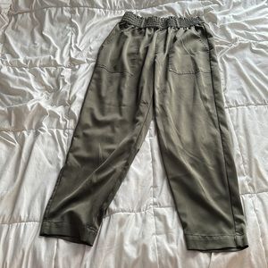 Green satiny jogger pants